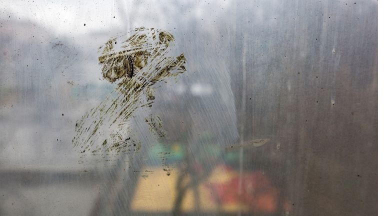 window cleaners left scratches on glass in saskatoon